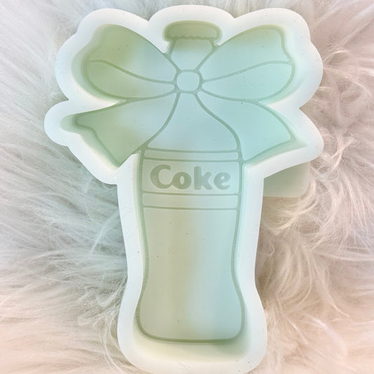 Coke with bow mold