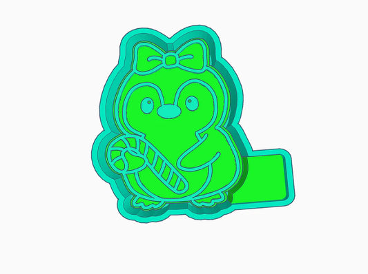 Penguin holding a candy cane mold (TFS)