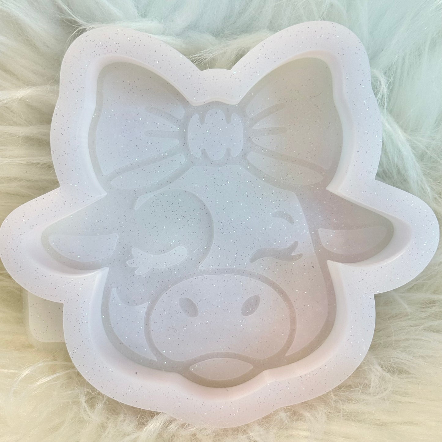 Cow with a bow mold