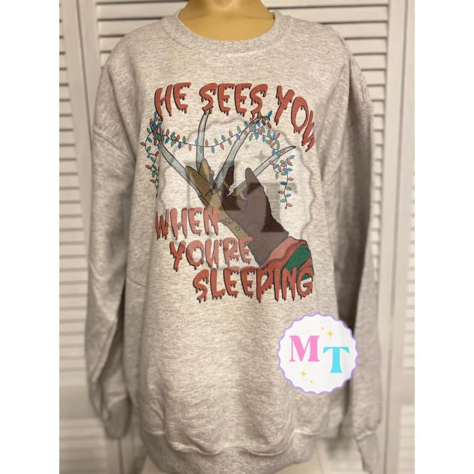 He sees you when you’re sleeping sweatshirt